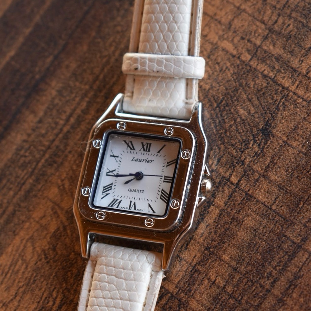 White Square Dial Watch with Roman Numerals and Silver Case